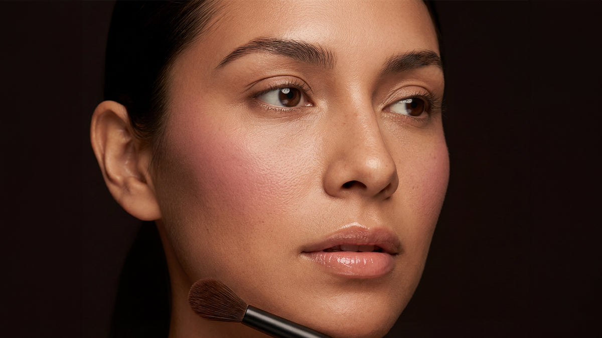 showing blush on face