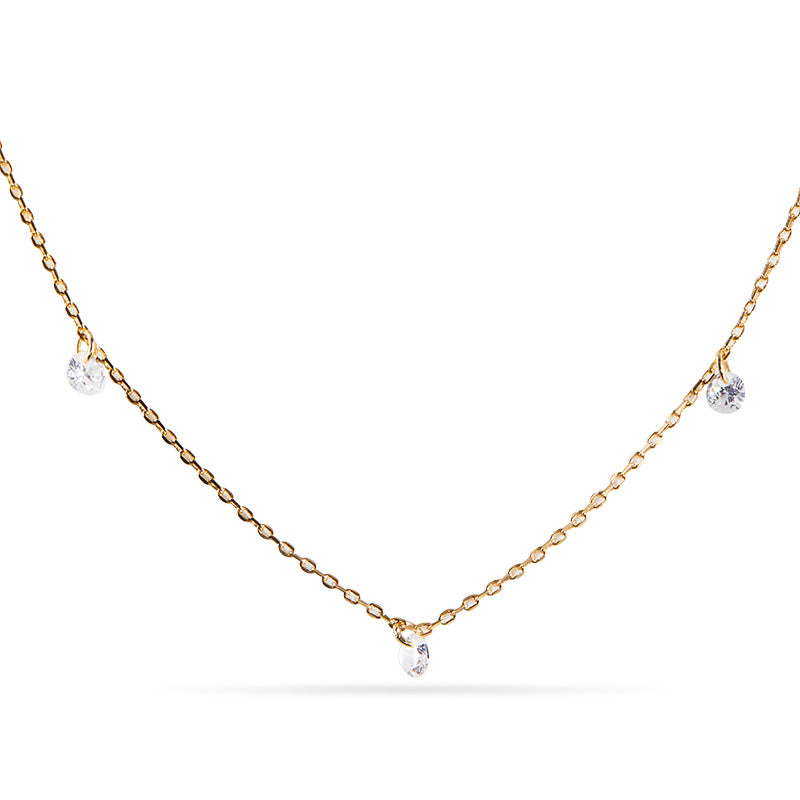 Closeup of Layered Desi - Pierced Round Cut Necklace in gold