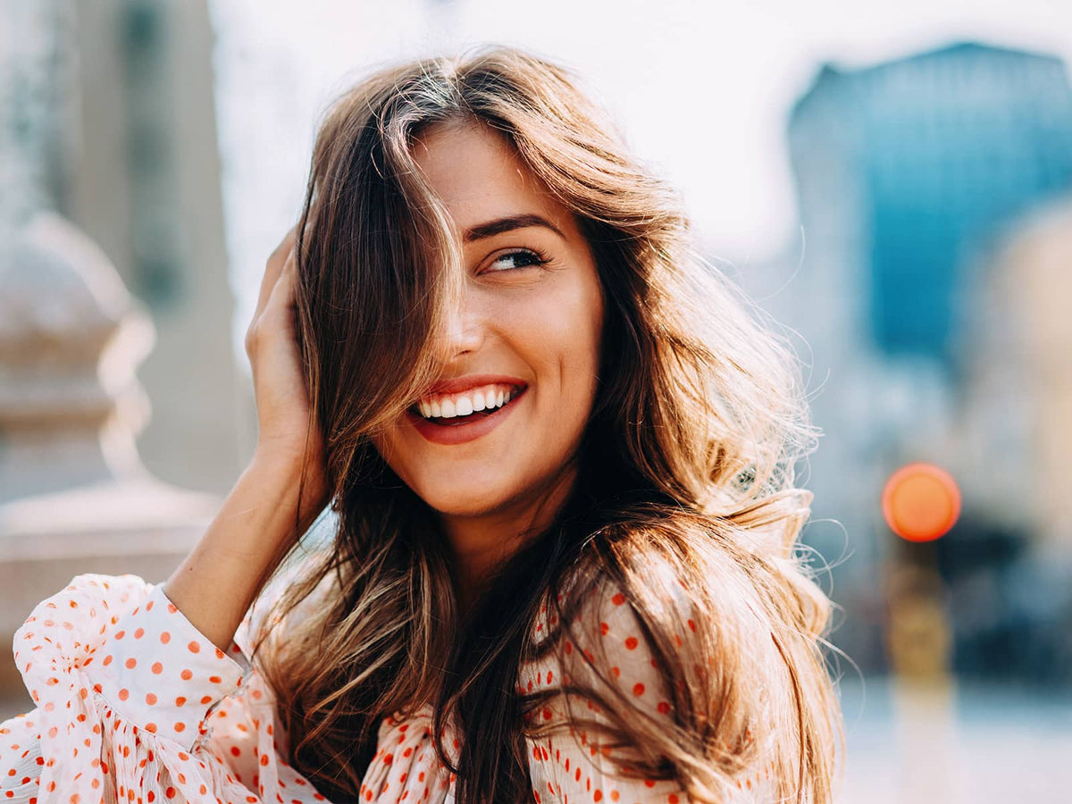 Woman touching her hair