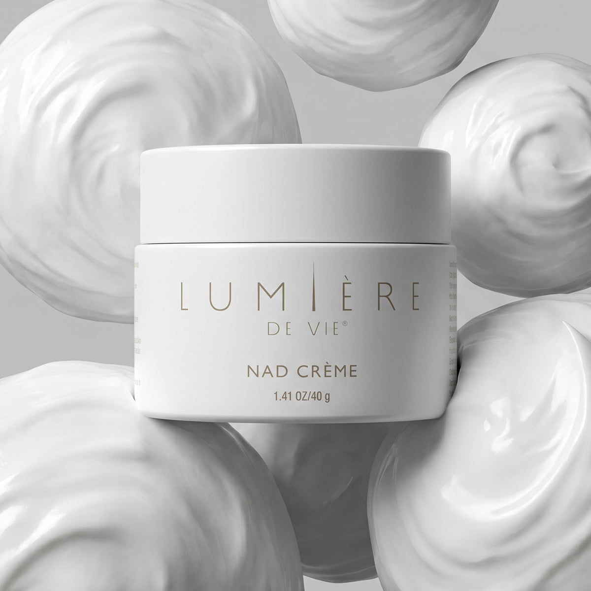 Nad Creme container balancing in white creme spheres