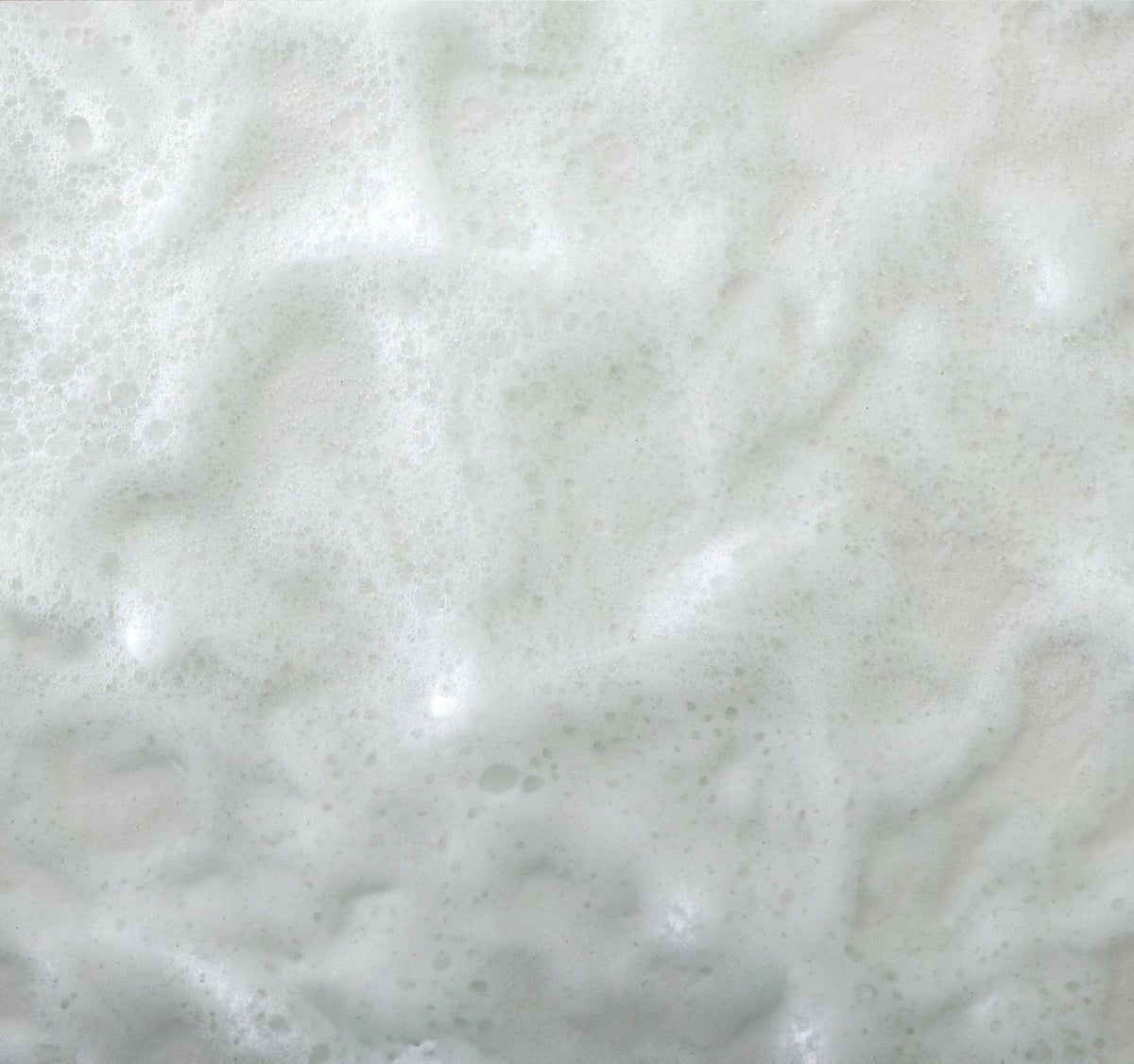 Close-up of a textured white surface with subtle variations