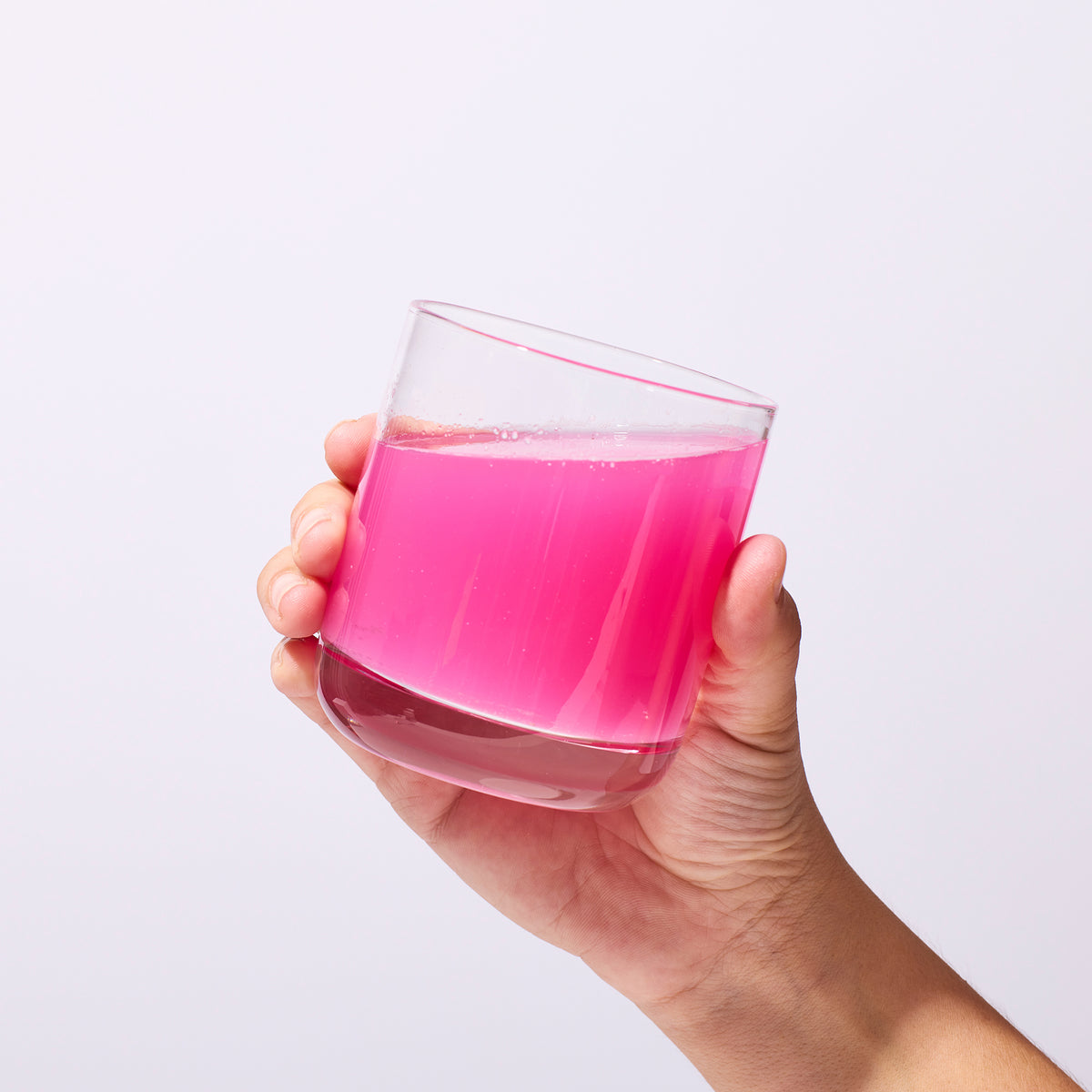 image of someone holding a glass containing a serving of Prime Secretagouge