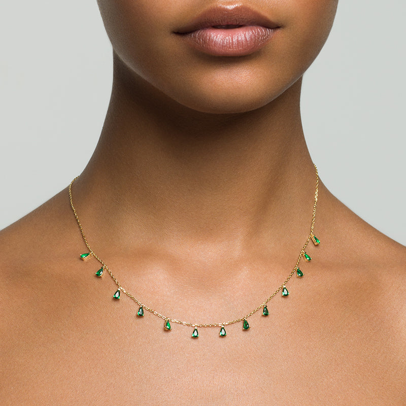 Layered KAI - Pear Drop Necklace on a model, in gold