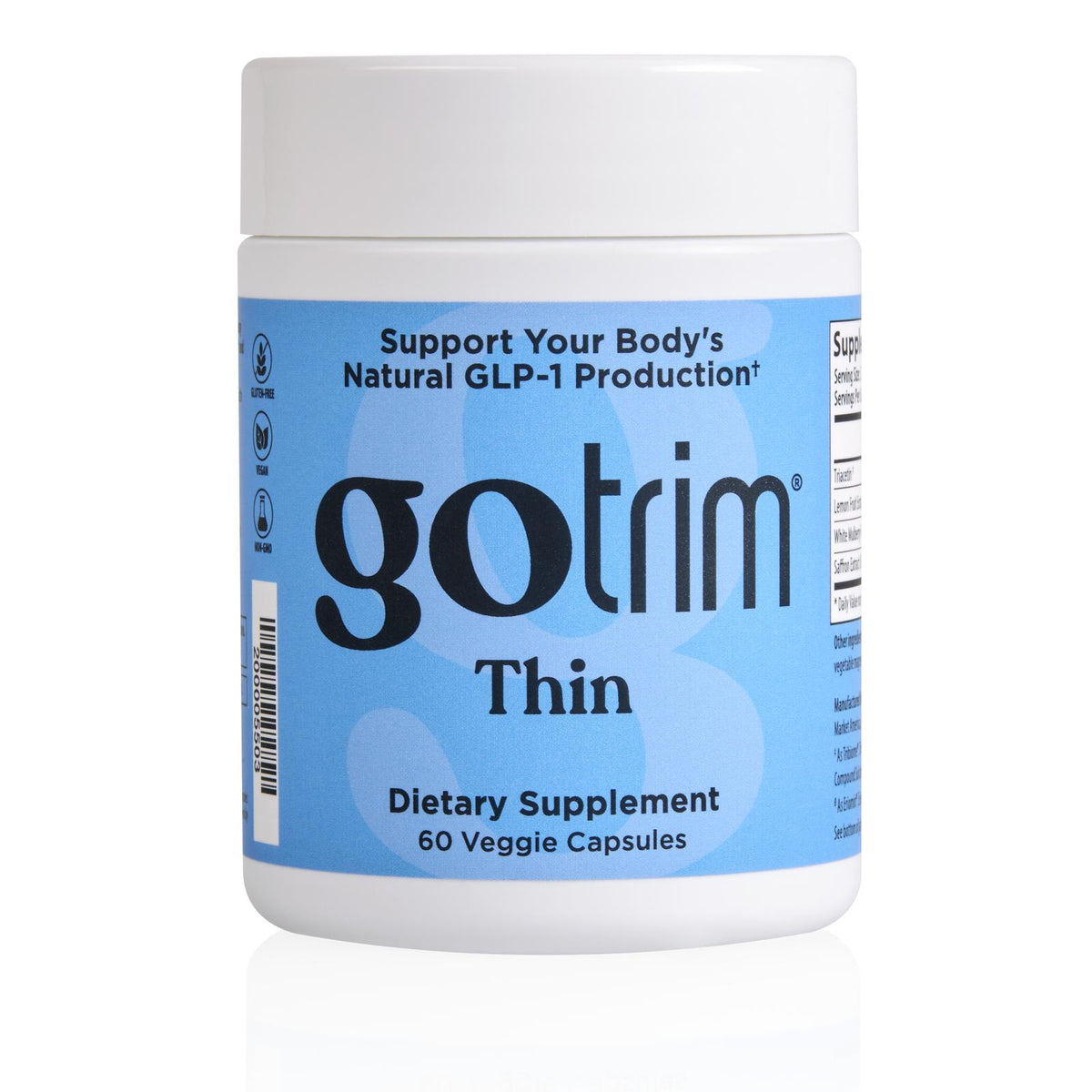 A white plastic bottle of gotrim Thin dietary supplement with a light blue label, shown on a white background with a soft reflection.