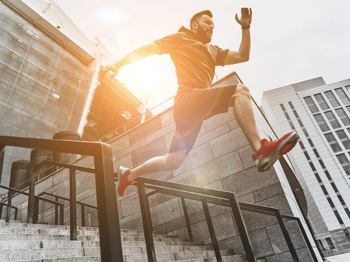 Person jumping off a staircase
