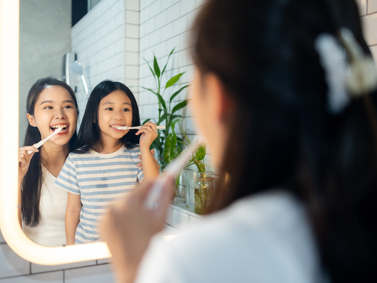 image of someone brushing their teeth