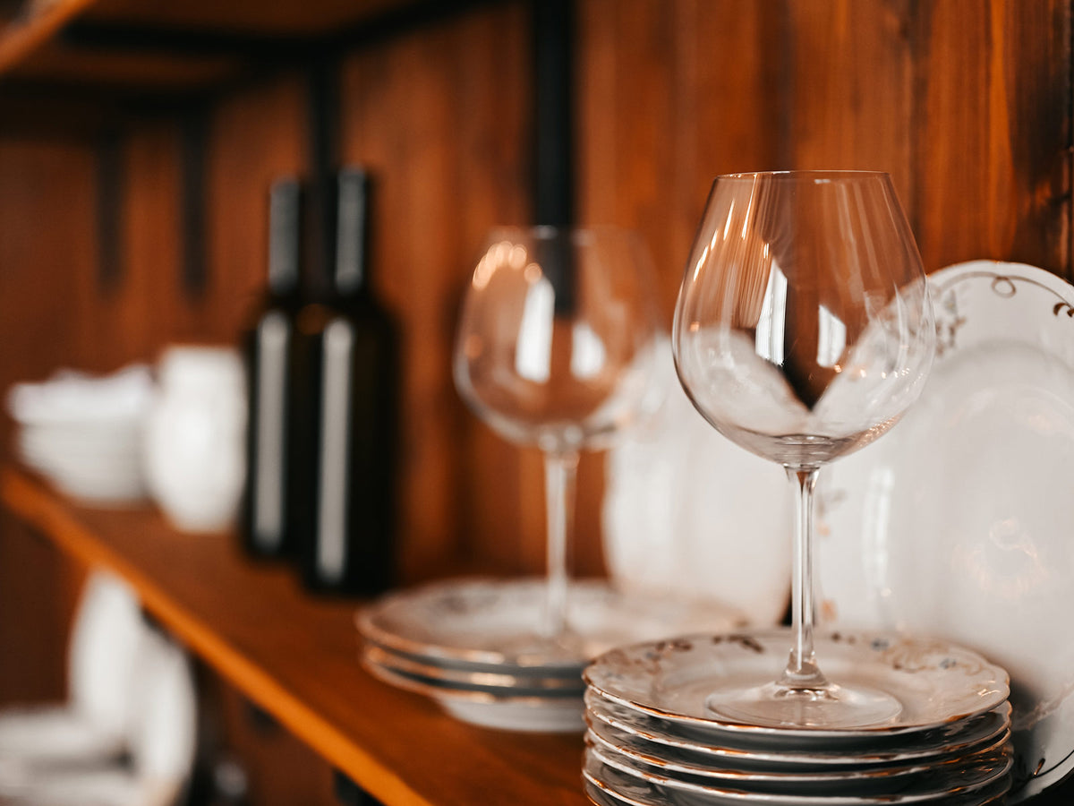 image of dishes and wine glasses