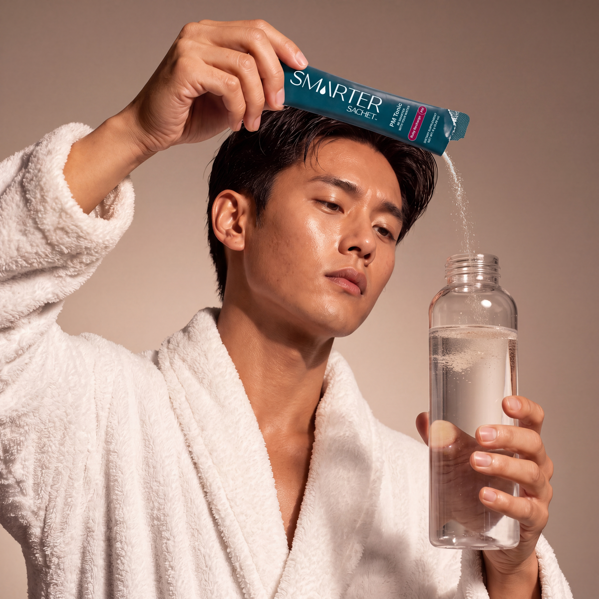 image of a man pouring a packet of Smarter Sachet PM into a water bottle