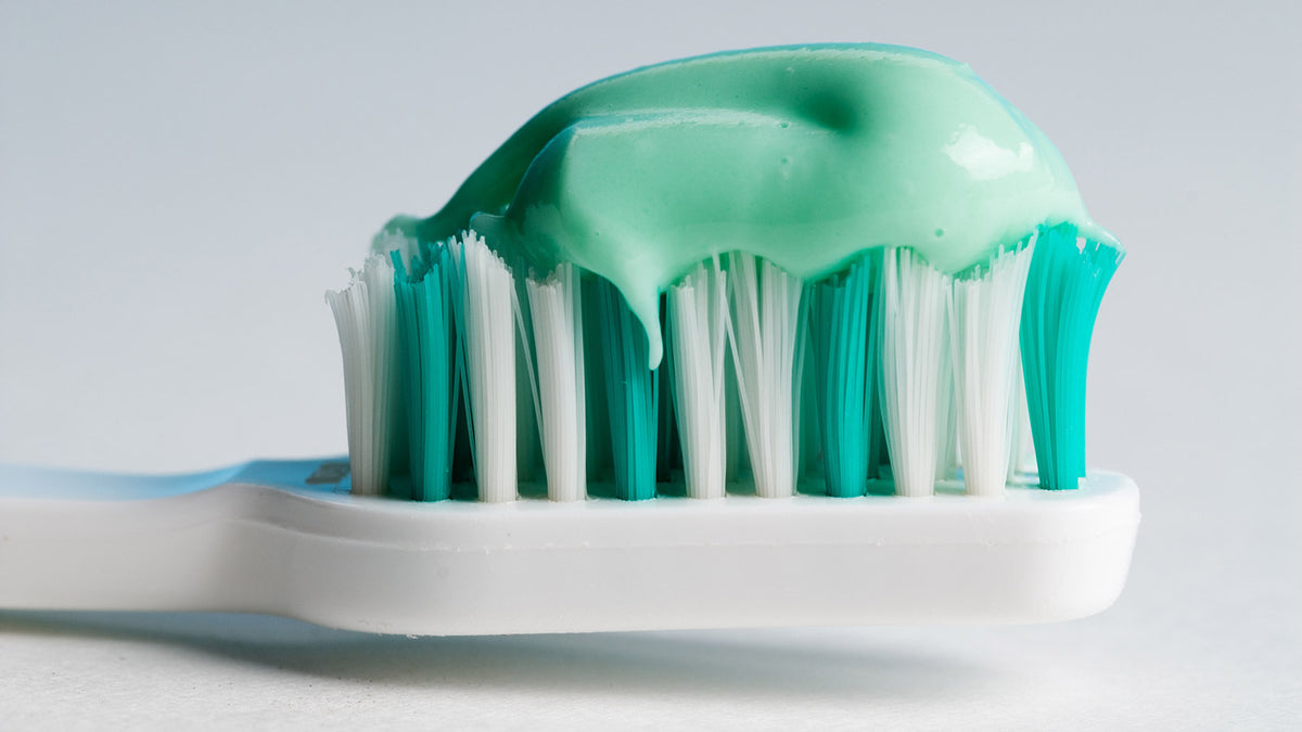 image of a toothbrush with toothpaste on it