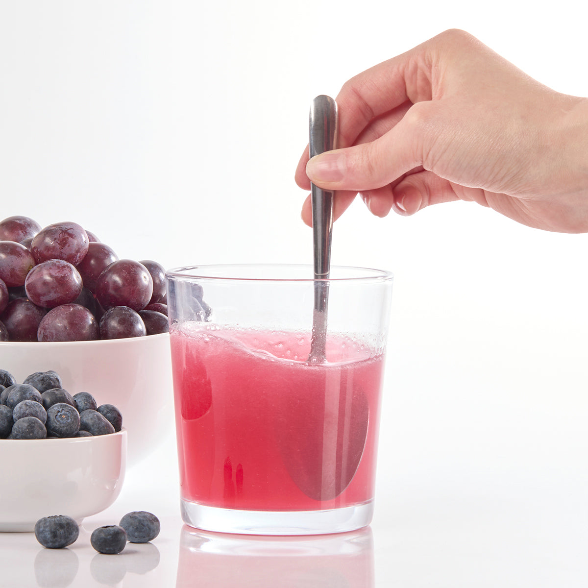 Image of mixed Isotonix OPC-3 with water in cup.