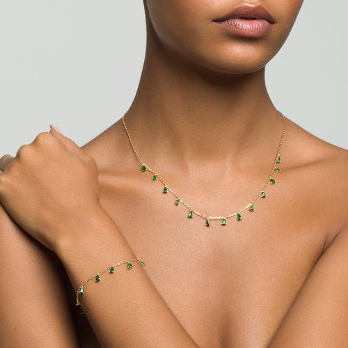 Layered KAI - Pear Drop Necklace in gold on a model