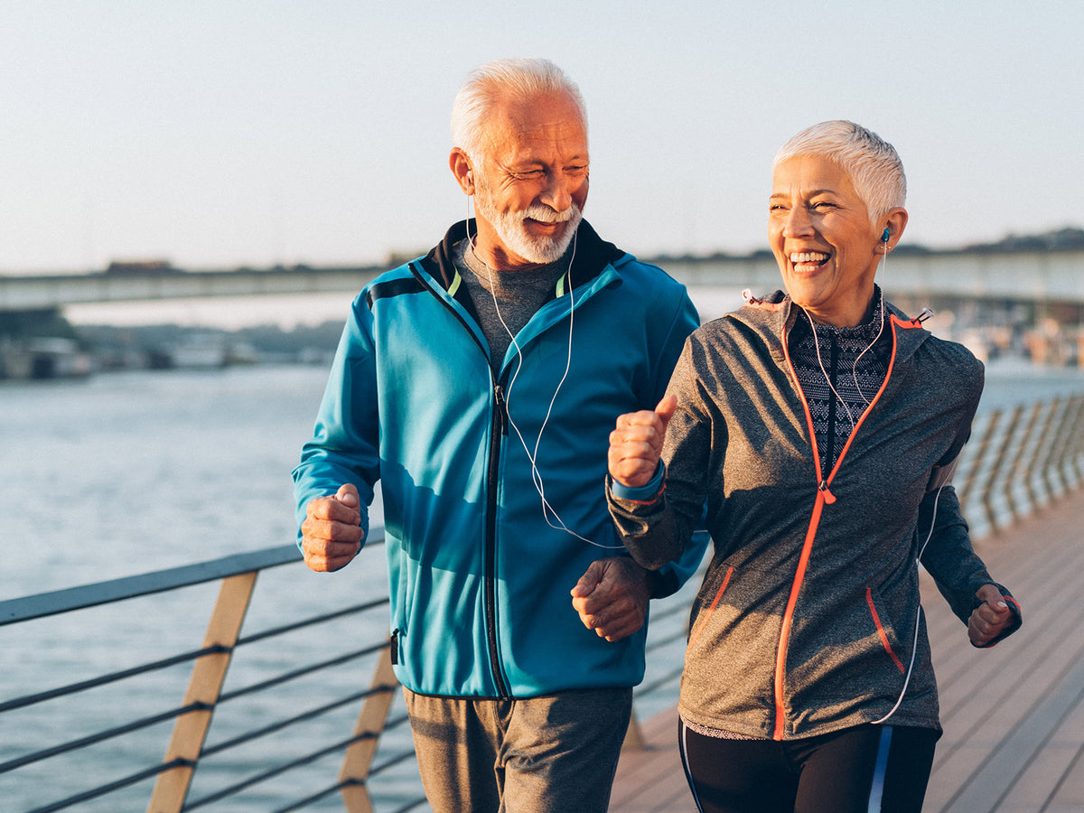 image of two elderly people jogging