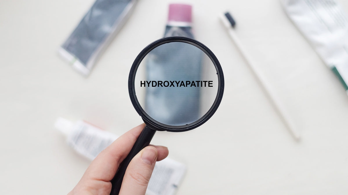 image of the word hydroxyapatite inside a magnifine glass
