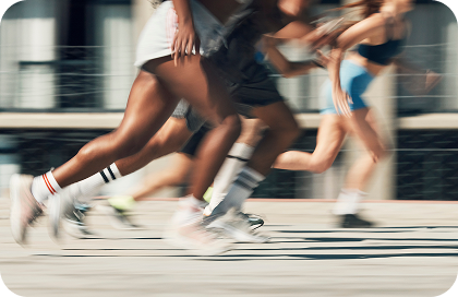 Blurred image of runners on a street