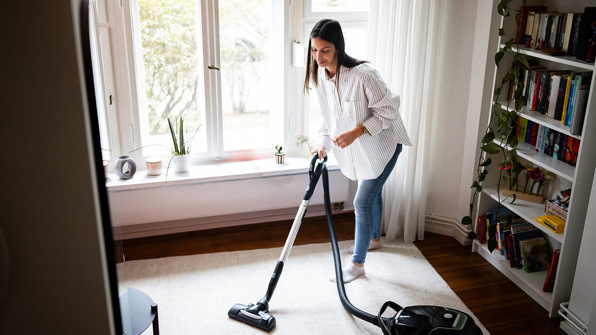 someone steam cleaning the floor