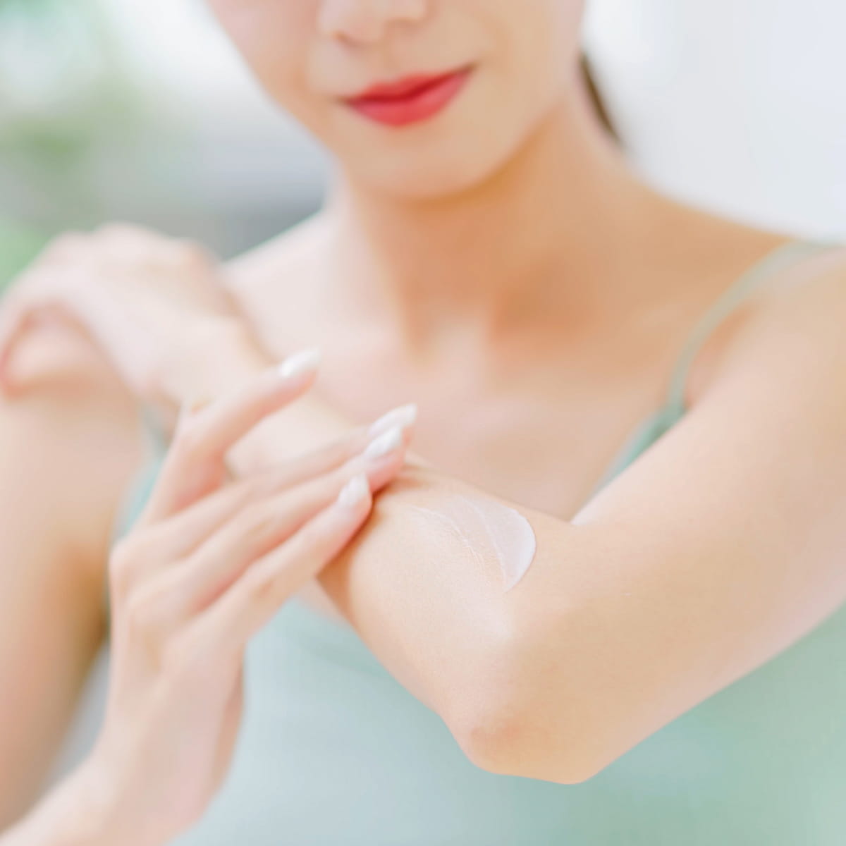 Woman applying to dry skin