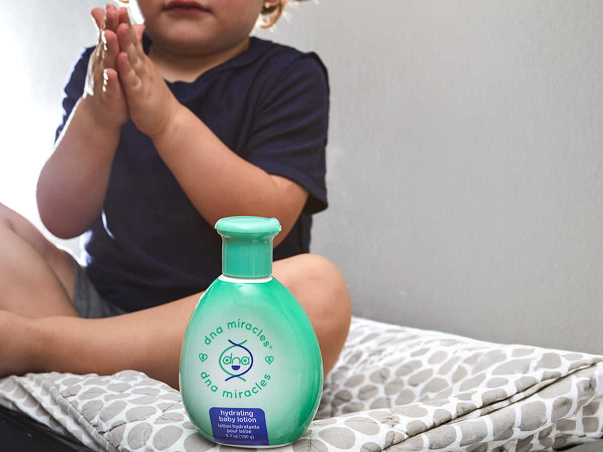 image of a baby next to DNA Miracles Hydrating Baby Lotion