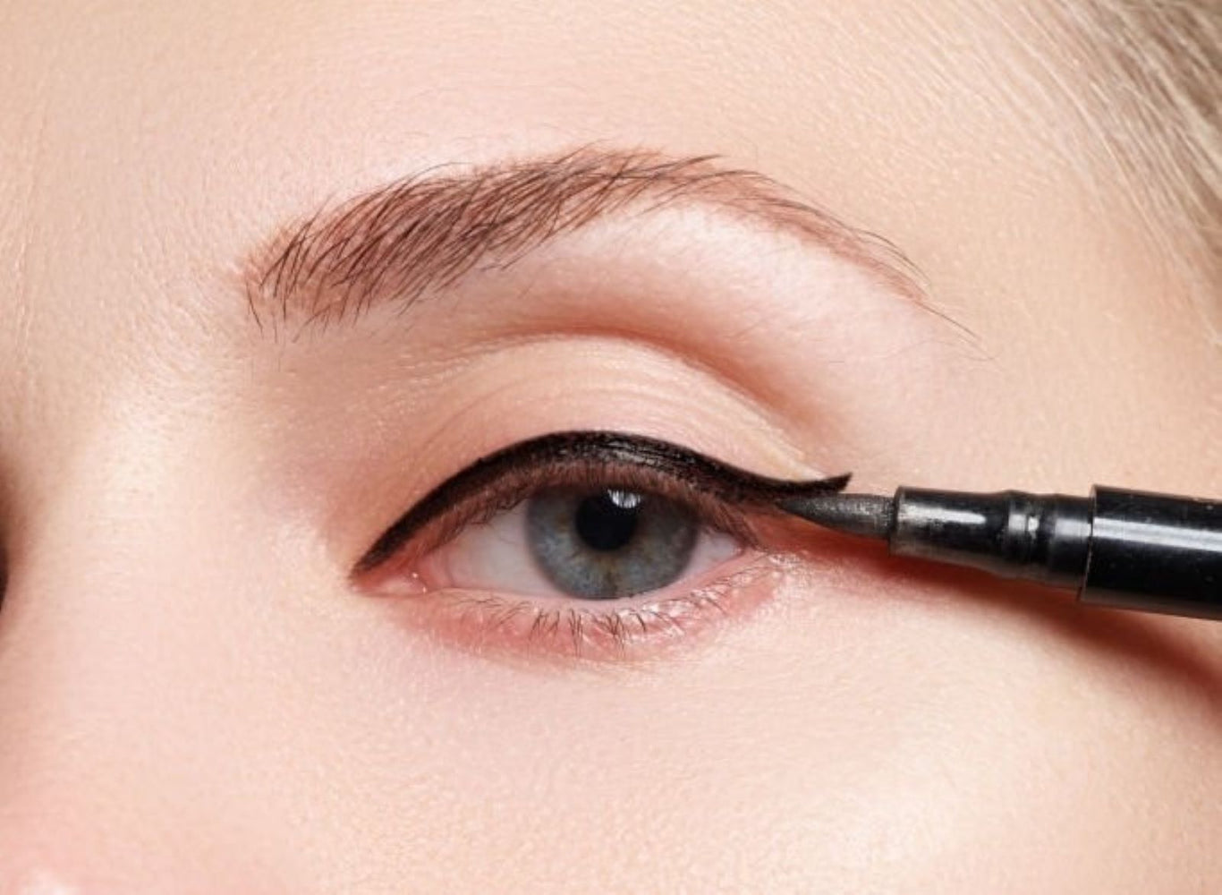 Eyeliner being applied to eyelid