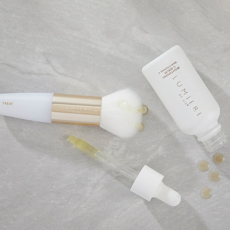 Lumière de Vie Skincare Brush Collection, treatment brush and Skin Brightening Serum showing the dropper 