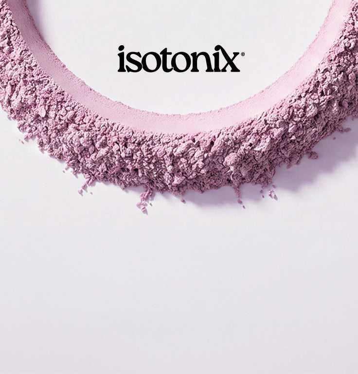 Isotonix loose powder makeup in a textured, shimmery mauve-pink shade, arranged in a semi-circle on a clean white background with the brand name printed in black at the top.