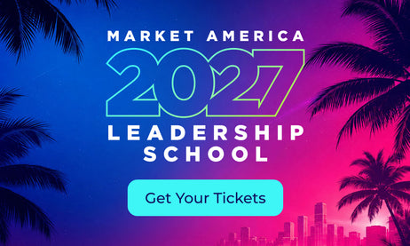 Promotional graphic for Market America 2027 Leadership School with large outlined '2027' text, 'MARKET AMERICA 2027 LEADERSHIP SCHOOL' in white, a turquoise 'Get Your Tickets' button, and palm tree silhouettes against a blue-to-pink gradient background with a city skyline at the bottom.