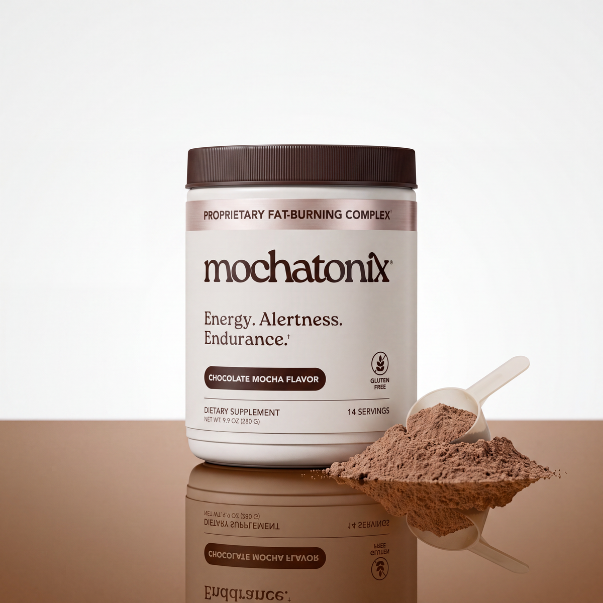A white tub of Mochatonix chocolate mocha flavor dietary supplement with a brown lid, shown on a reflective brown surface with a scoop of powder beside it against a light gray background.