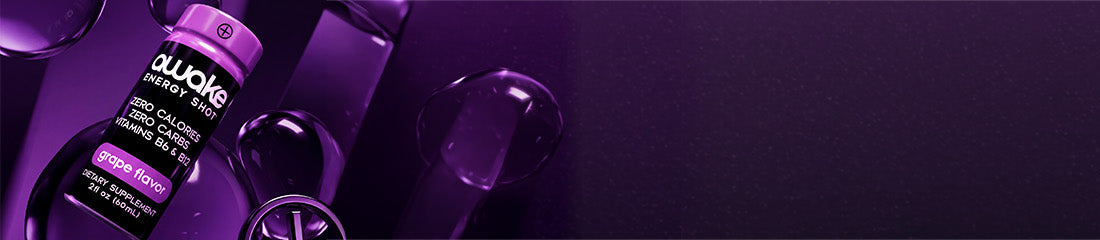A close-up promotional shot of a purple bottle labeled 'Majestic' with matching purple glass vessels on a dark purple background.