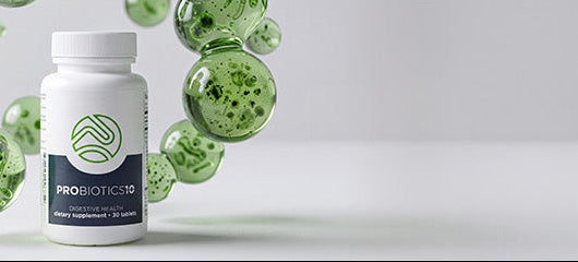 A white supplement bottle labeled 'PROBIOTICS' with green and white decorative bubbles around it, set against a clean light gray background with ample negative space on the right.