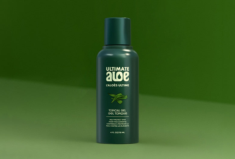 A dark green bottle of Ultimate Aloe Torsional Gel stands centered against a matching green gradient background.